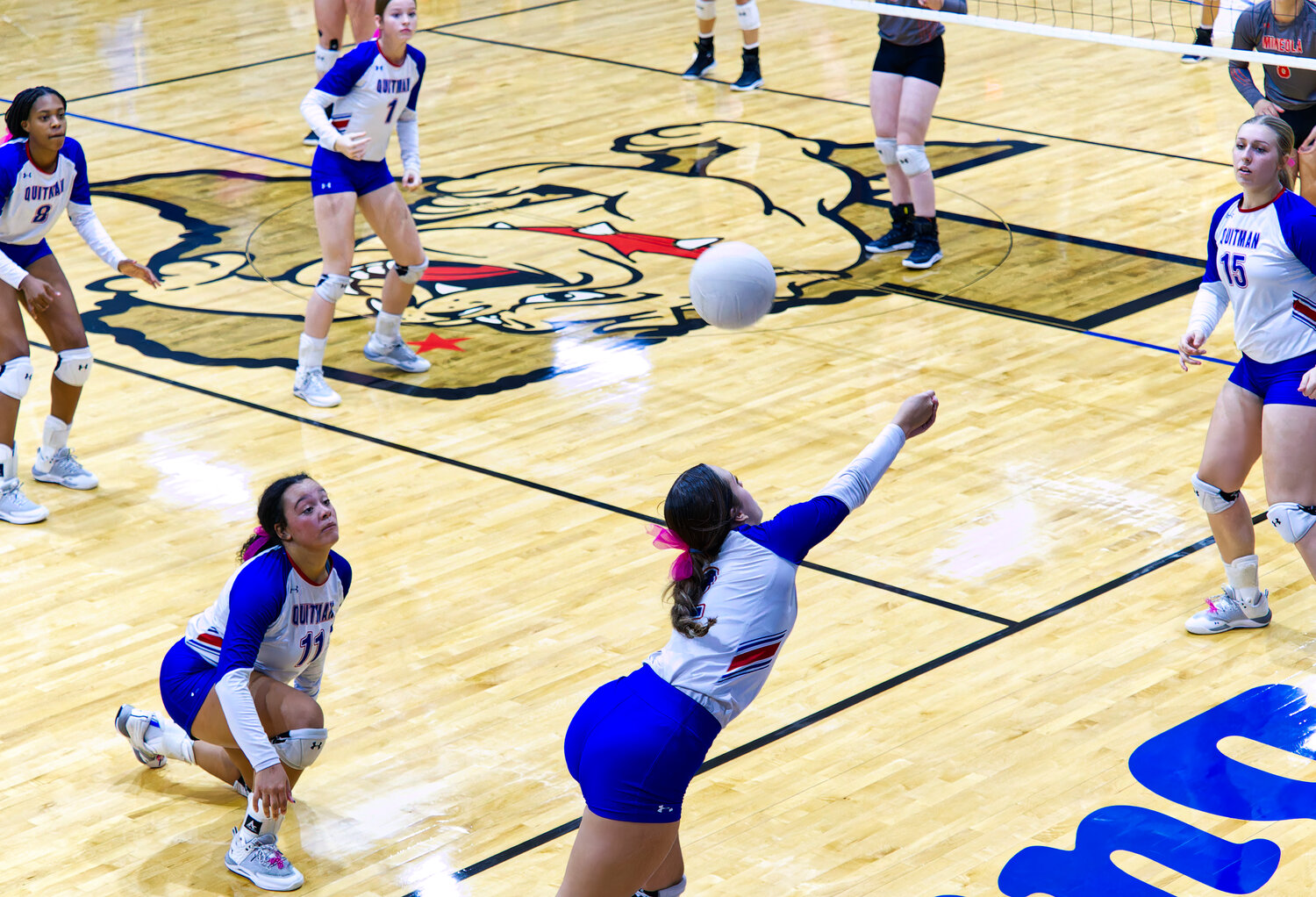 Kallie Hoover pays off Ashley Davis' dig with a recovery shot. [view more volleyball]